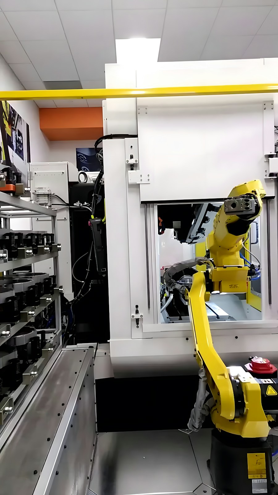 Industrial robotic arm inside a manufacturing facility