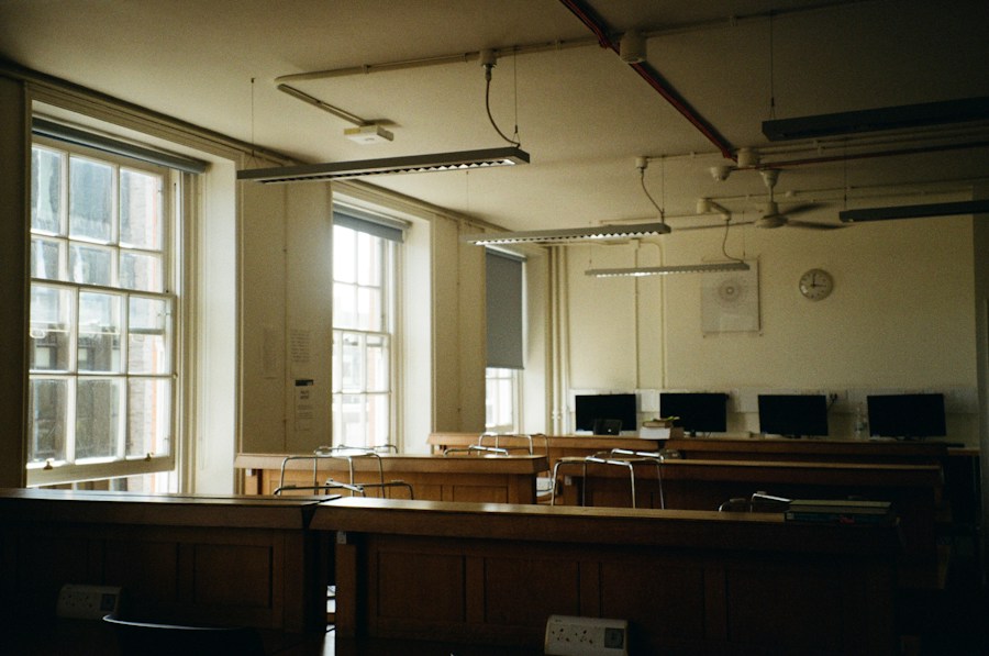 Empty classroom with computers and work tables